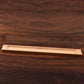 Wooden incense stick holder on a wooden surface, perfect for home decoration and aromatherapy.