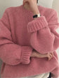 Pull rose femme